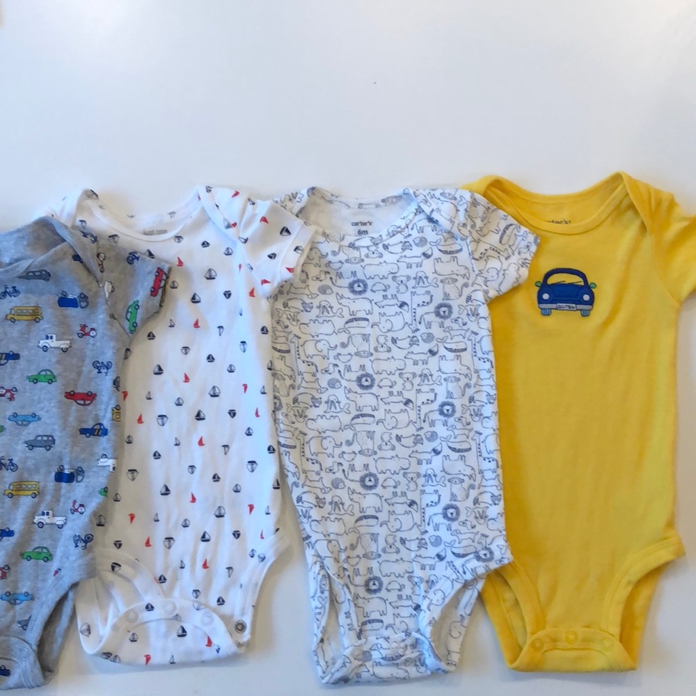 9 New onesies - Carter’s